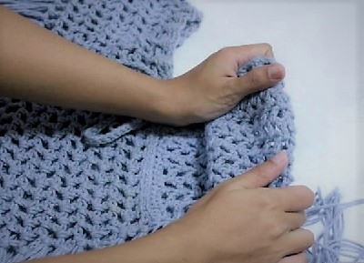 как растянуть шерстяной свитер после стирки